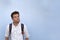 Caucasian mature man in white shirt looking up. He is not sure about something.