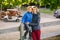 Caucasian mother hugging embracing child boy outdoor on autumn day