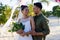 Caucasian newlywed young couple smiling and looking at each other at wedding ceremony at beach