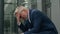 Caucasian old senior businessman feel bad unwell upset mature business man stressed middle-aged stress despair employer