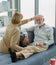 Caucasian old senior elderly supportive wife sitting use hand testing temperature from unhealthy gray bearded and hair husband