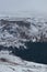 Caucasian Reserve of Russia in winter. Power and majesty of nature. Coniferous dark green forest in distance and high snowy