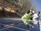 Caucasian seasoned technician cleaning the solar panels with a hose