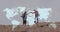 Caucasian senior couple hiking holding hands on cliff, over moving world map