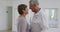 Caucasian senior couple spending time together dancing in a ballroom