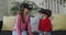 Caucasian siblings wearing vr headset, sitting on sofa and having fun