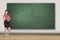 Caucasian teacher standing in the classroom
