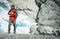 Caucasian Tourist Exploring Scenic Norwegian Glacier