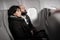 Caucasian travellers having conversation on commercial flight