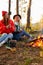 Caucasian travellers relax in forest. hiking and camping together