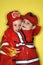 Caucasian twin boys dressed as firemen.