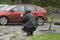 Caucasian woman crouching to take a photo