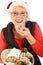 Caucasian woman eating traditional cake