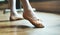 A Caucasian woman and girl practising ballet