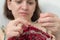 Caucasian woman knitting