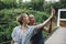 Caucasian woman and man taking a selfie outdoors recreational leisure, freedom and adventure concept