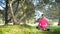 Caucasian woman practicing meditation in the park