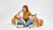 Caucasian woman sit and hug Shiba Inu dogs