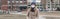 Caucasian woman in surgical mask walking outdoor in Toronto.