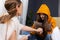 Caucasian women holding hands during therapy session, feeling reconciled, giving psychological support, empathy, overcome problem