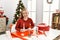 Caucasian young blonde woman doing christmas handcraft creative decoration looking positive and happy standing and smiling with a