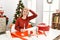 Caucasian young blonde woman doing christmas handcraft creative decoration stressed and frustrated with hand on head, surprised
