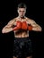 Caucasian young boxer boxing man portrait waist up  black background