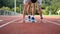 Caucasian young man ready on a running  track