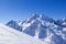 Caucasus Mountains, Panoramic view of the ski slope  on the horizon in winter day. Dombai ski resort, Western Caucasus, Karachai-