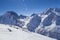 Caucasus Mountains, Panoramic view of the ski slope  on the horizon in winter day. Dombai ski resort, Western Caucasus, Karachai-