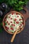 Cauliflower couscous with herbs and pomegranate, top view