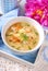 Cauliflower cream soup with chicken and parmesan cheese