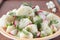 Cauliflower salad with radish and greens