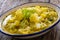 Cauliflower soup on wooden table background