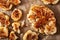 Cauliflower steaks with herb and spice on baking tray. plant based meat substitute