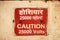 Caution 25000 high voltage safety warning sign board in red color and the instructions to communicate at work to say keep away