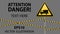 Caution - danger Warning sign safety. Beware of the Car. A yellow triangle with a black image. The sign on the pole and