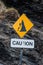 Caution falling rocks sign