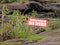 Caution notice of dam being opened at Athirapally waterfalls, Kerala, India