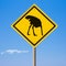 Caution ostrich ahead yellow road sign