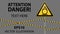 Caution oxidizer. Safety sign. Safety at work. Yellow triangle with black image, metal pillar, protective tapes