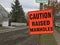 Caution Raised Manholes, Road Construction Sign