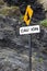 Caution rock fall sign on Ballybunion beach