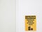 The Caution sign `Chemical Waste Storage Area, a safety sign warning on white wall in laboratory room, useful for caution who work