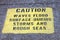 Caution sign on pier