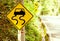 Caution of slippery roads - traffic signs beside country road