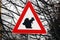 Caution squirrel crossing sign, red triangle with squirrel