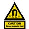 Caution, strong magnetic field. Safety sign.