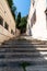 Cavaillon traditional small stairs stones alley house building in Provence France