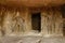 Cave 9, Entrance left shrine with bodhisattvas and bhadrasana Buddha. Aurangabad Caves